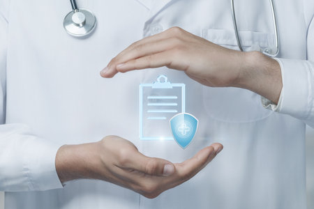 A healthcare professional is emphasizing the significance of medical insurance while holding a digital representation of patient documentation and a protective shield symbolizing coverage.の写真素材