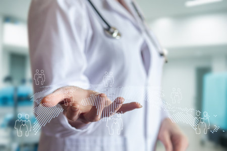 A healthcare expert stands in a modern medical environment, displaying virtual data on their hand. The background shows equipment, emphasizing innovation in patient care technologies.の写真素材