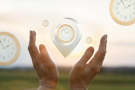 Hands embracing time in a serene sunset landscape. Two hands reaching out to a glowing clock symbol...