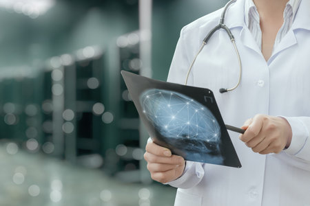 A healthcare professional analyzes medical data while holding a digital clipboard.
