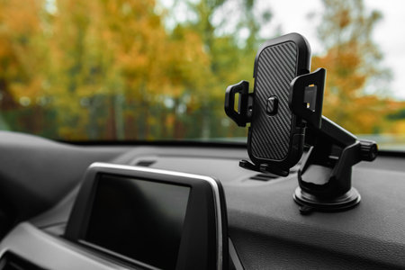 Universal car dashboard holder for smart phone.
