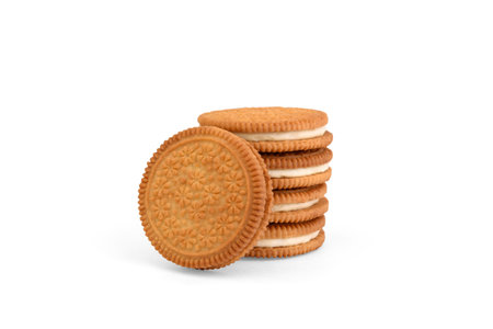 Stack of shortbread cookies with coconut filling isolated on white background.の写真素材