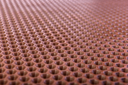 Brown rubber entrance mat texture or background.