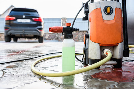 Manual car wash with high pressure washing outside.の写真素材