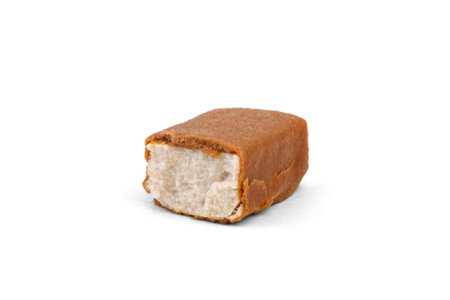 Glazed cheese in caramel chocolate isolated on white background.の写真素材