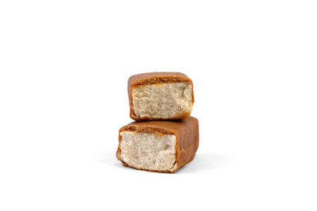 Glazed cheese in caramel chocolate isolated on white background.の写真素材