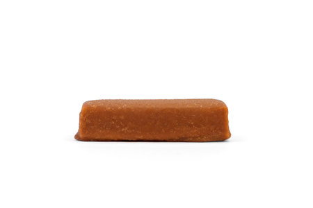 Glazed cheese in caramel chocolate isolated on white background.の写真素材