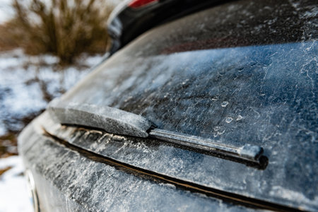 Dirty rear car window in winter.の写真素材