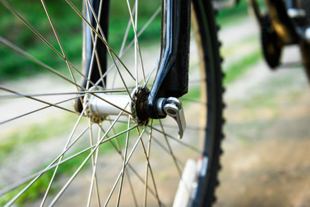 Close up detail of front wheel of mountain bike.