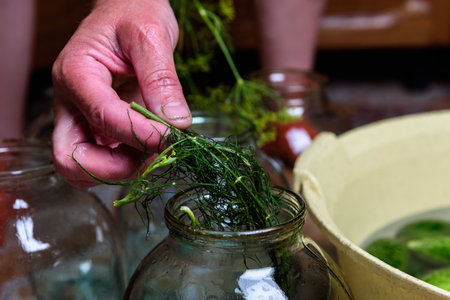 Preservation of seasonal vegetables. Woman's hands preparing ingredients for canned food, cooking...
