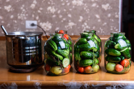 Preservation of seasonal vegetables. Preparation vegetables in jars and ingredients for canned food, cooking processの写真素材