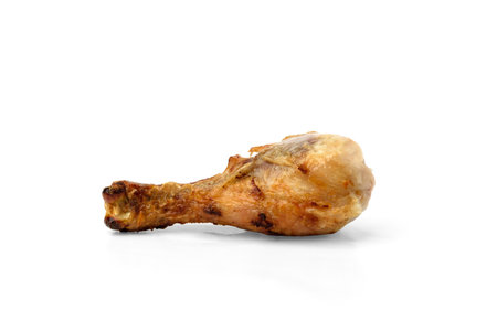Baked chicken legs isolated on white background.の写真素材