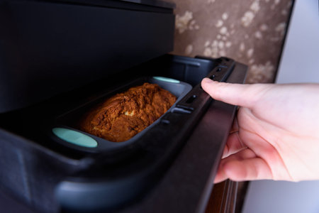 Cooking a cupcake with raisins