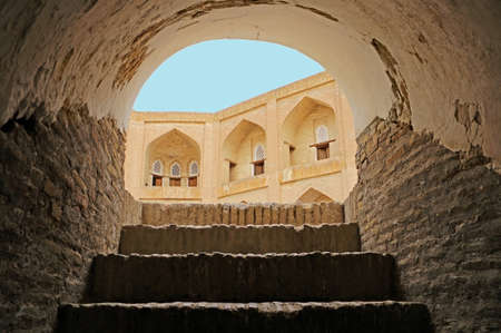 Exit from an old brick building in the style of Asian Muslim architecture. Historical architecture...