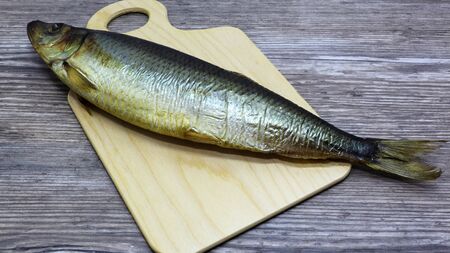 fresh fish on a cutting board	