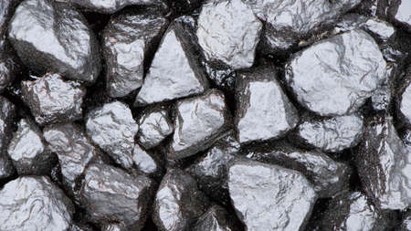 Background of many black stones. The pattern caused by the arrangement of many stones for the...