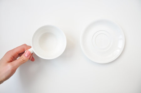 empty white cup with flowers on 8th Marchの写真素材