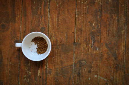 Brewed coffee cup on brown backgroundの写真素材