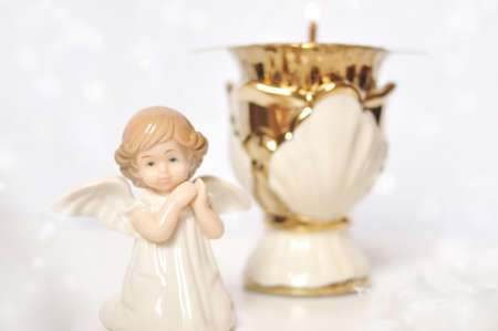 cute little angel in the sky with white cloudsの写真素材