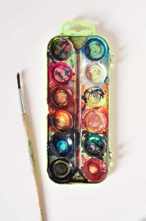 old paint and brush for painting on white background.preschool education for childrenの写真素材