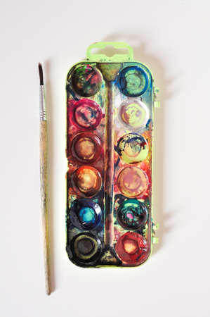 old paint and brush for painting on white background.preschool education for childrenの写真素材