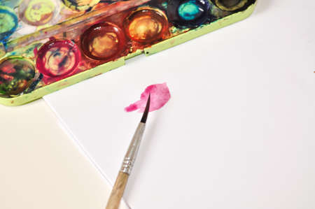 old paint and brush for painting on white background.preschool education for childrenの写真素材