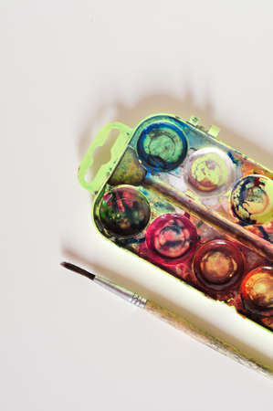 old paint and brush for painting on white background.preschool education for childrenの写真素材