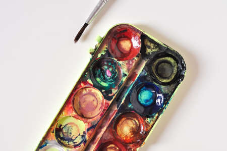 old paint and brush for painting on white background.preschool education for childrenの写真素材