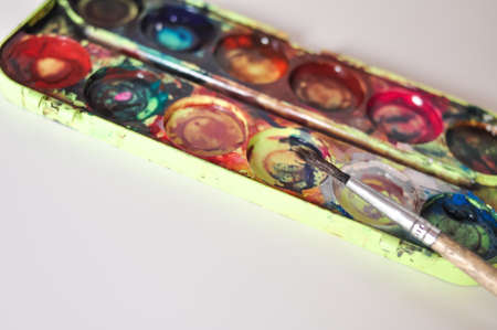 old paint and brush for painting on white background.preschool education for childrenの写真素材