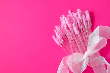 Cute colored brushes for hairing eyelash extensions and browsの写真素材