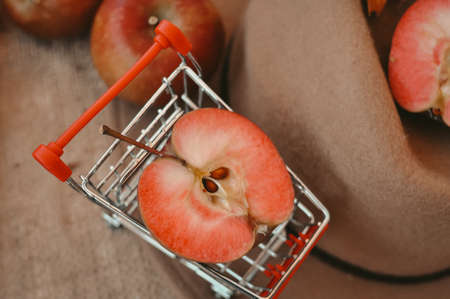 Red apple harvest in bag autumn season . High quality photo