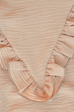 Part of baige puffy dress details macro . High quality photoの写真素材