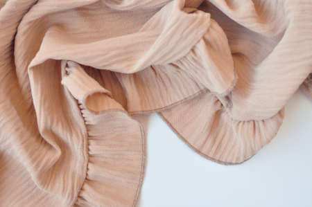 Part of baige puffy dress details macro . High quality photoの写真素材