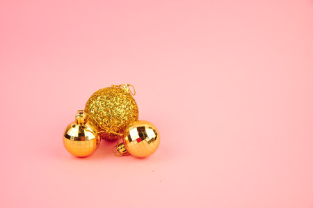 Cute Christmas decorations on pink background copy spaceの写真素材
