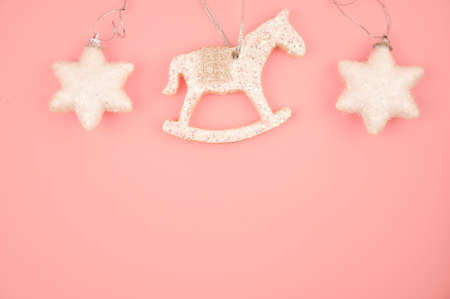 Cute Christmas decorations on pink background copy spaceの写真素材
