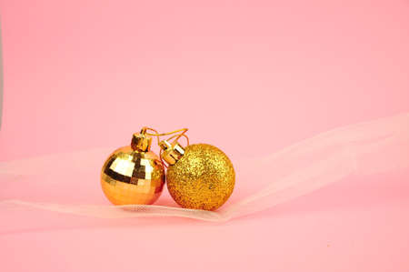 Cute Christmas decorations on pink background copy spaceの写真素材