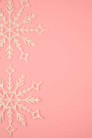 Cute Christmas decorations on pink background copy spaceの写真素材