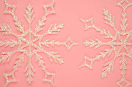 Cute Christmas decorations on pink background copy spaceの写真素材