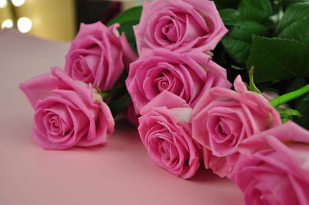 Bouquet of roses on pink background copy spaceの写真素材