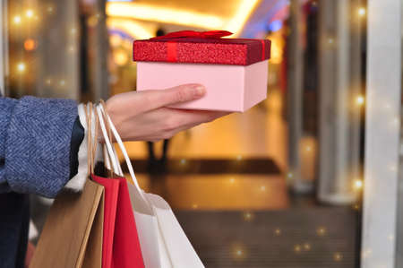 customers hand holding shopping bagの写真素材