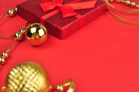 Christmas decorations for tree and home on red backgroundの写真素材