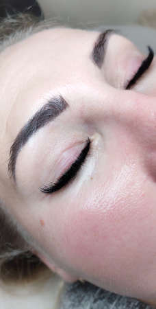 Lash extensions in beauty salon macro eyeの写真素材