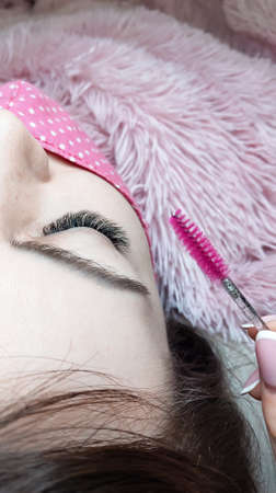 Lash extensions in beauty salon macro eyeの写真素材