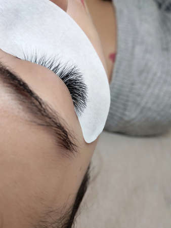 Lash extensions in beauty salon macro eye . High quality photoの写真素材