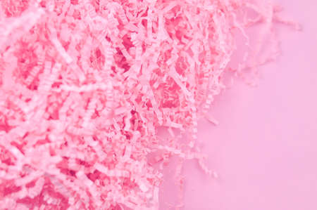 Calm pink background with tissue paper in present boxの写真素材