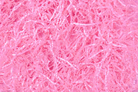 Calm pink background with tissue paper in present boxの写真素材