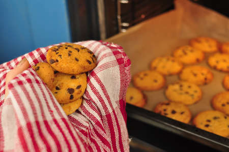sweet crunchy cookies with dark chocolate for teatime copy spaceの写真素材