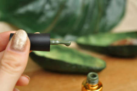 Green natural color of gel polish for manicure . High quality photoの写真素材