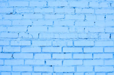 Blue brick wall background copy space . High quality photoの写真素材