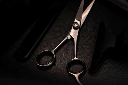 Equipment for hair stylist on black background . High quality photoの写真素材
